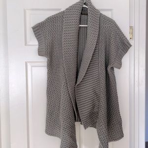 Loose knit and slouchy open front sweater with shawl style neck